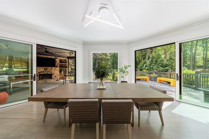 3117 West Roxboro Road Northeast Atlanta, GA 30324 - Photo 26 of 78 a view of a dining table and chairs in a room