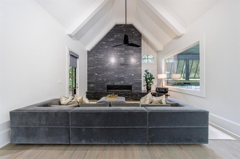 3117 West Roxboro Road Northeast Atlanta, GA 30324 - Photo 28 of 78 a living room with furniture and a fireplace
