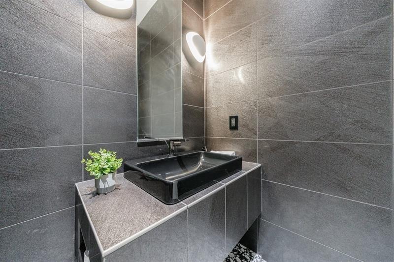 3117 West Roxboro Road Northeast Atlanta, GA 30324 - Photo 34 of 78 a bathroom with a sink and a mirror