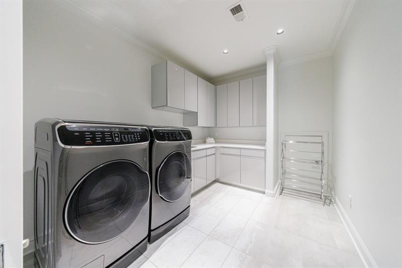 3117 West Roxboro Road Northeast Atlanta, GA 30324 - Photo 51 of 78 a utility room with sink dryer and washer