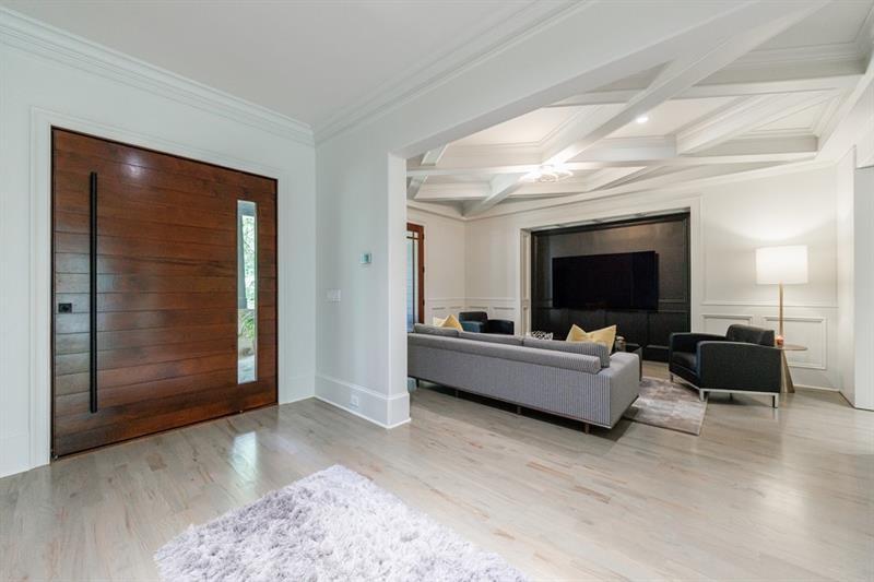 3117 West Roxboro Road Northeast Atlanta, GA 30324 - Photo 7 of 78 a living room with furniture and a flat screen tv