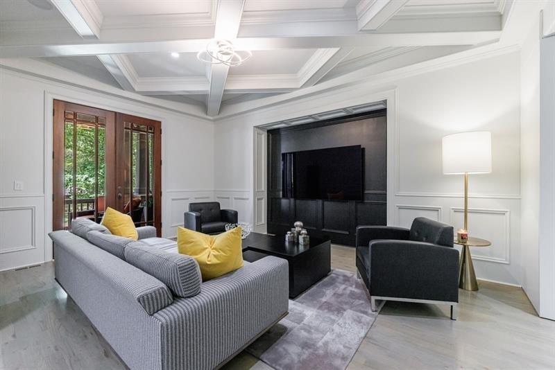 3117 West Roxboro Road Northeast Atlanta, GA 30324 - Photo 9 of 78 a living room with furniture and a flat screen tv