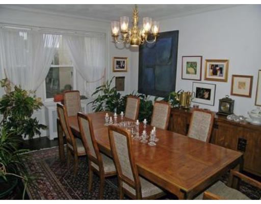 132 Sewall Avenue, Unit B Brookline, MA 02446 - Photo 6 of 18 a view of a dining room with furniture and chandelier