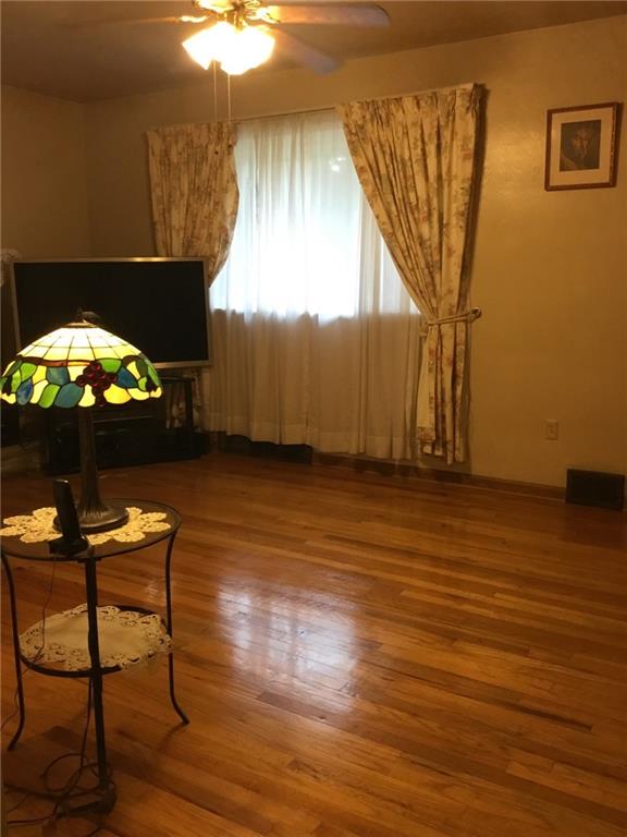2166 Butler Logan Road Tarentum, PA 15084 - Photo 5 of 25 The living room is very spacious and the floors are pristine!