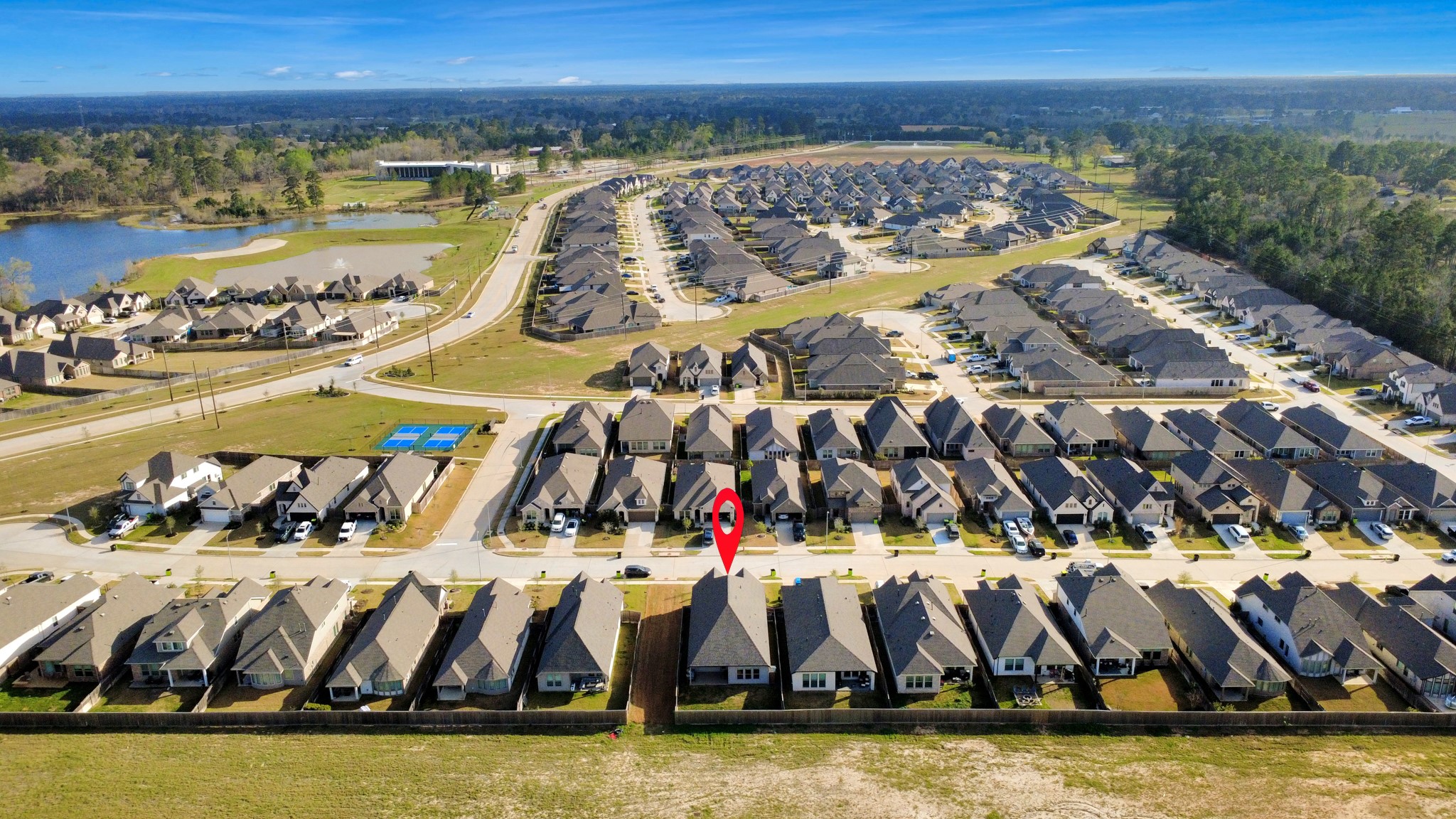 42546 Summer Crst Road Magnolia, TX 77354 - Photo 26 of 27 Aerial view showcasing your home, walking trails, pickleball court and much more in Escondido!