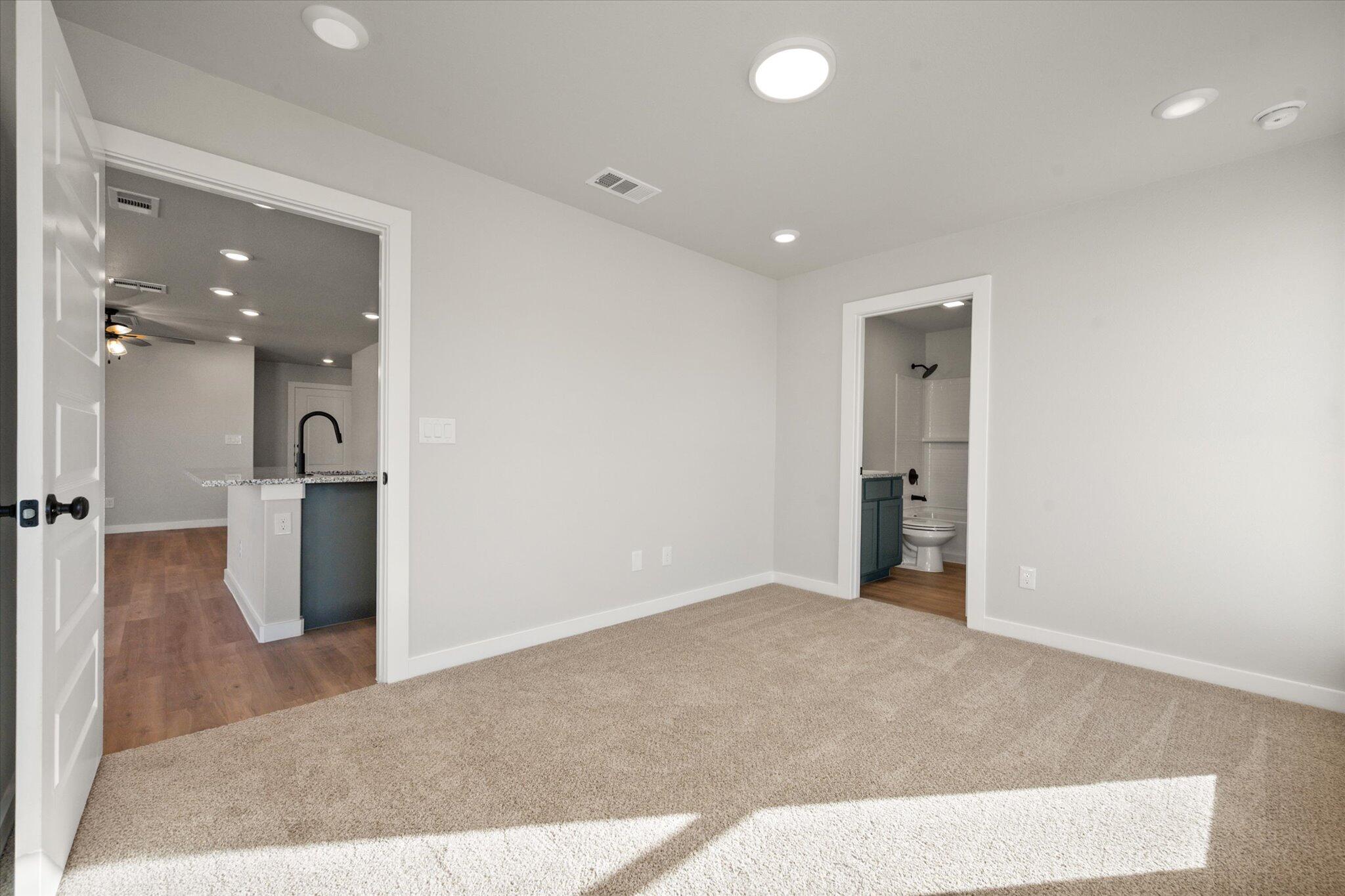 6302 Volney Avenue Lubbock, TX 79407 - Photo 14 of 20 wooden floor in a room