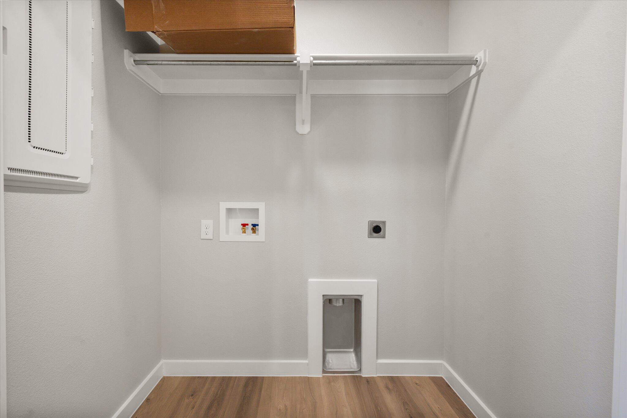 6302 Volney Avenue Lubbock, TX 79407 - Photo 19 of 20 a view of small space with racks on the wall