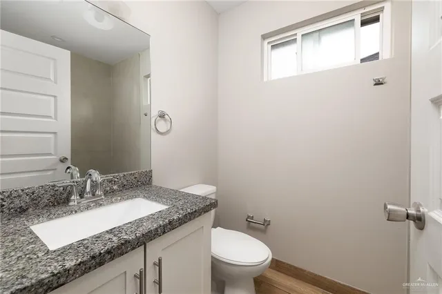 an aerial view of a house with a garden