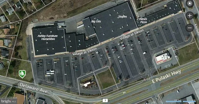 a view of a yard with an outdoor space