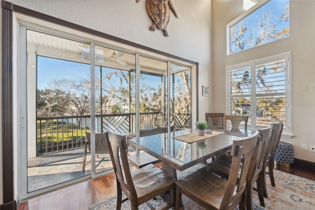 5287 Tuna Lane Weeki Wachee, FL 34607 - Photo 21 of 85 a view of a dining room with furniture window and outside view