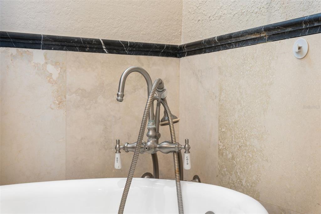 5287 Tuna Lane Weeki Wachee, FL 34607 - Photo 40 of 85 a bathroom with a shower and a sink