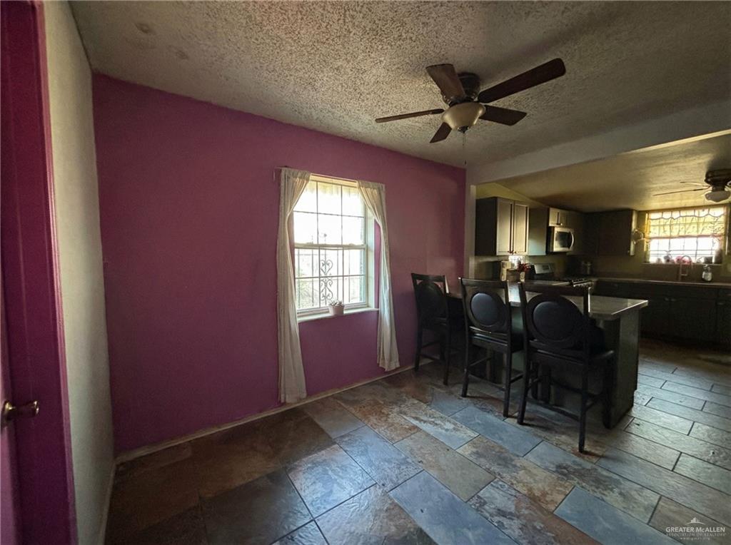 1901 South 34th Street McAllen, TX 78503 - Photo 11 of 13 a view of a livingroom with furniture window and wooden floor