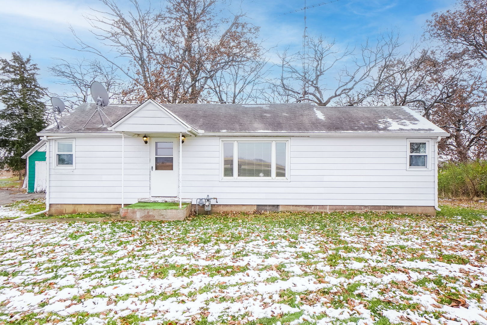 1737 Lee Center Road Amboy, IL 61310 - Photo 3 of 19 a front view of a house with a yard