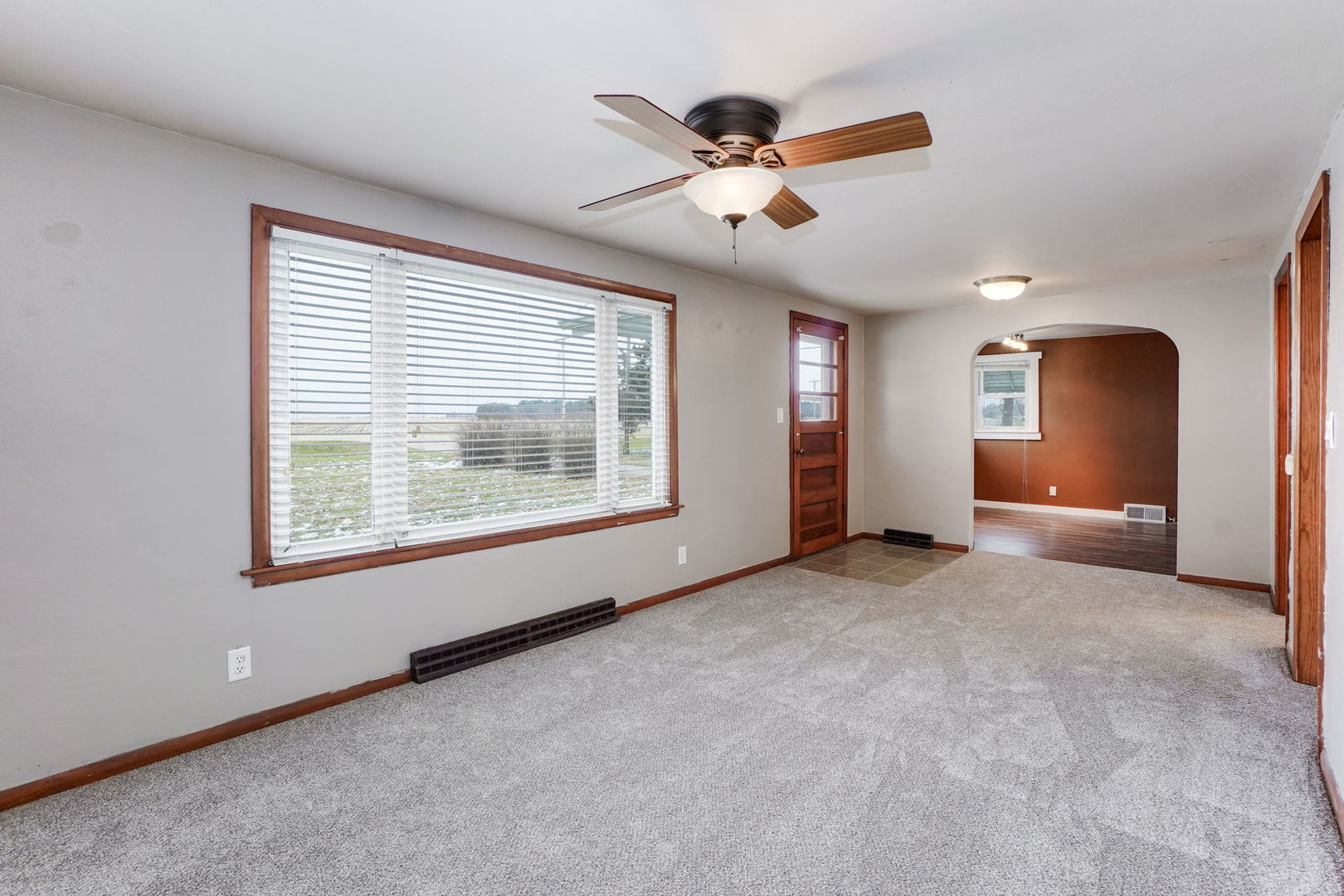 1737 Lee Center Road Amboy, IL 61310 - Photo 5 of 19 a view of an empty room with a window