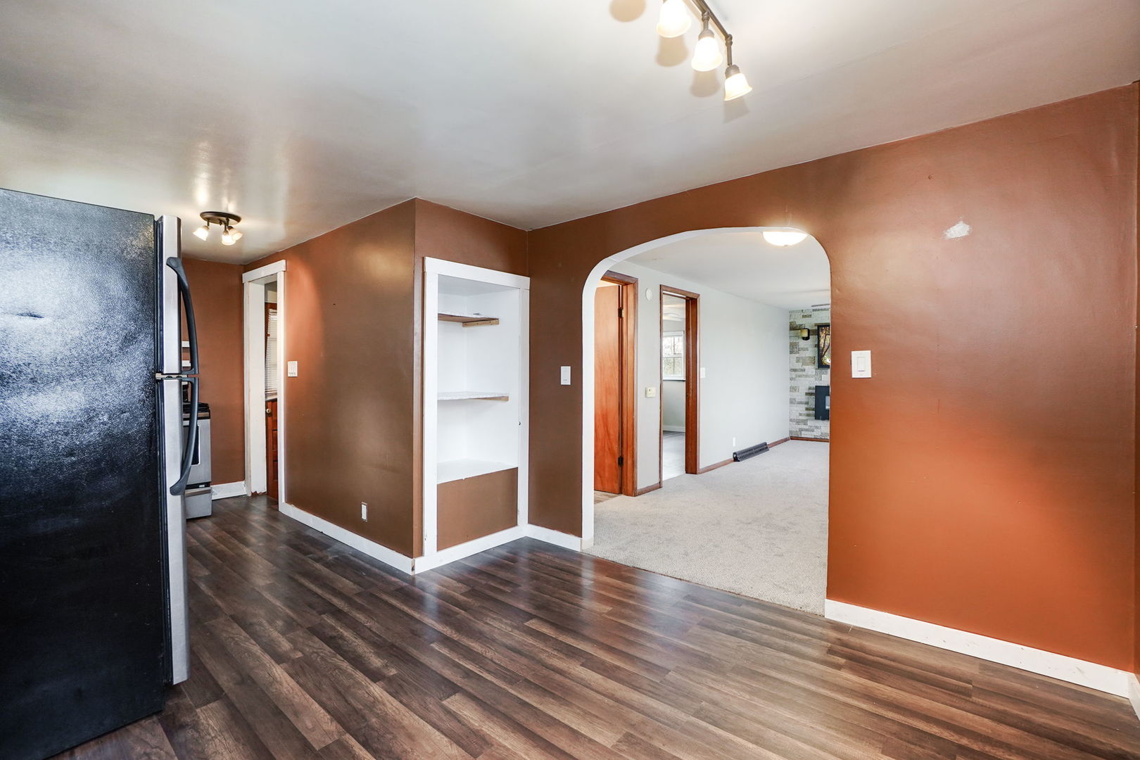1737 Lee Center Road Amboy, IL 61310 - Photo 7 of 19 a view of a hallway with wooden floor