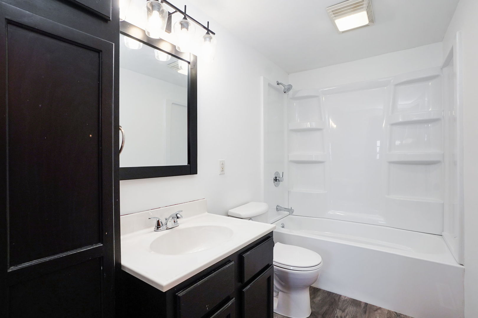 1737 Lee Center Road Amboy, IL 61310 - Photo 10 of 19 a bathroom with a sink a toilet and shower