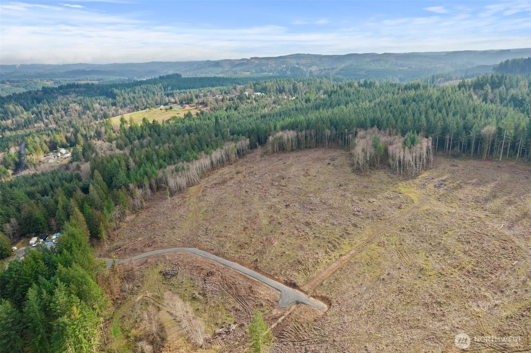 0 Little Hanaford Road, Unit C Centralia, WA 98531 - Photo 6 of 21 a view of a lake with a mountain