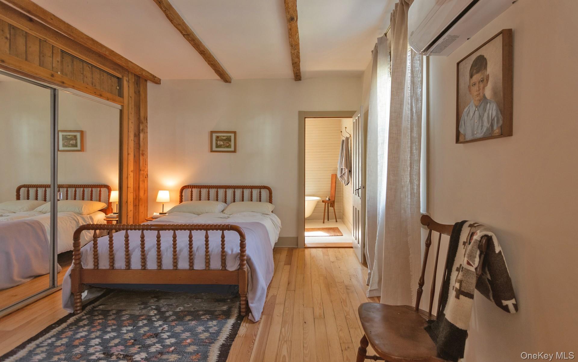 692 County Rte 2 Elizaville, NY 12523 - Photo 13 of 33 a bedroom with bed and wooden floor