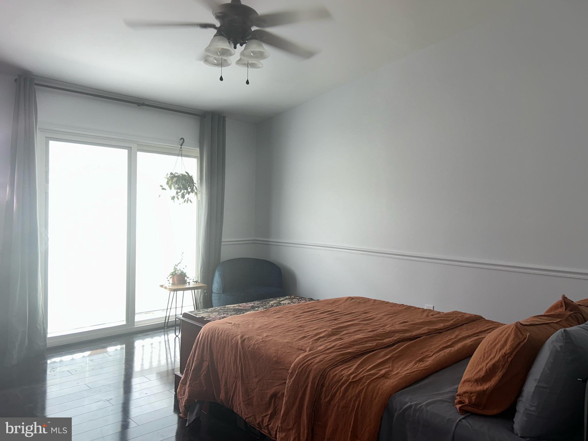 13349 Shea Place Herndon, VA 20170 - Photo 18 of 26 a bedroom with a bed and a window