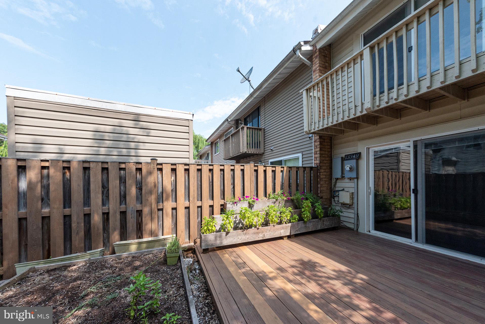 13349 Shea Place Herndon, VA 20170 - Photo 22 of 26 a view of a backyard with pathway