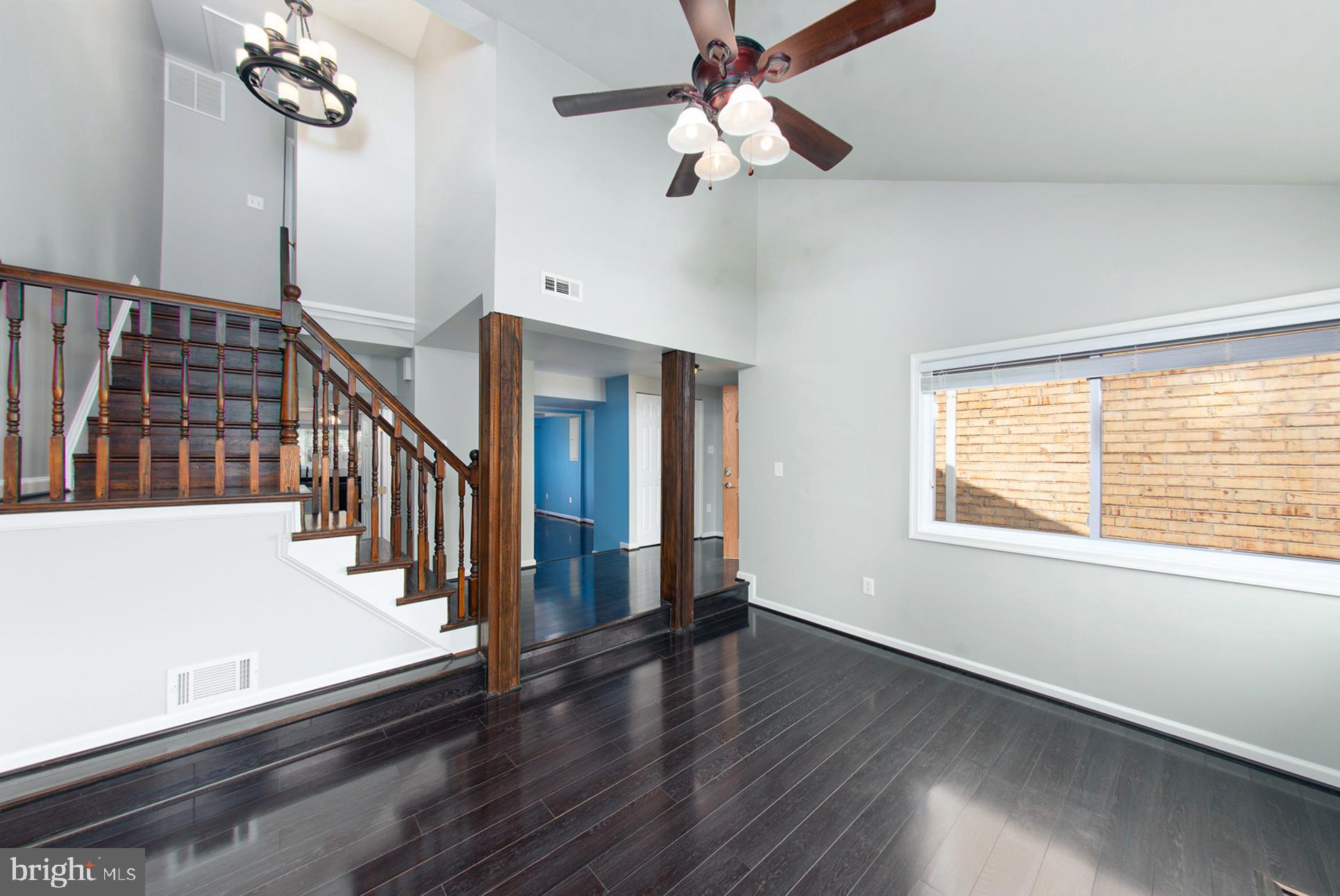 13349 Shea Place Herndon, VA 20170 - Photo 3 of 26 wooden floor in an empty room with a window