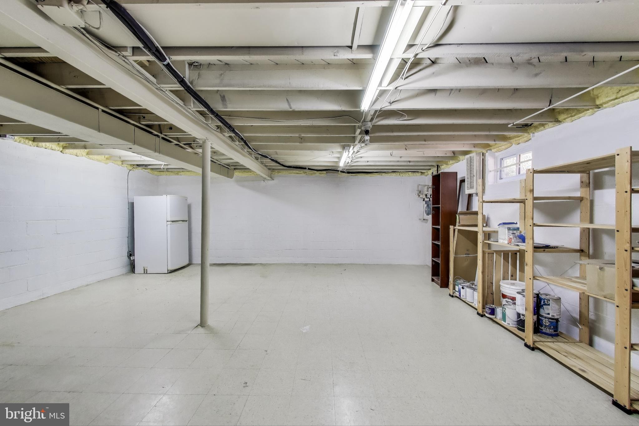 8905 Spring Valley Road Chevy Chase, MD 20815 - Photo 29 of 42 a view of an empty room with storage