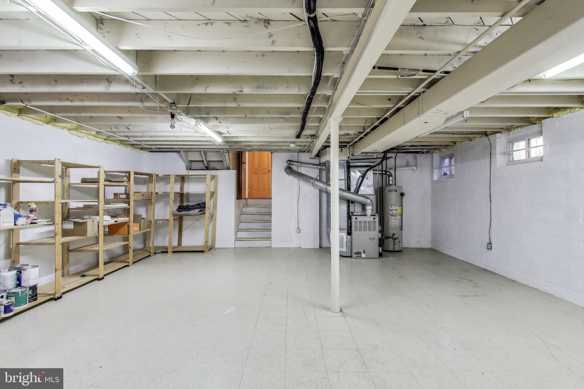 8905 Spring Valley Road Chevy Chase, MD 20815 - Photo 30 of 42 a view of empty room with wooden ceiling