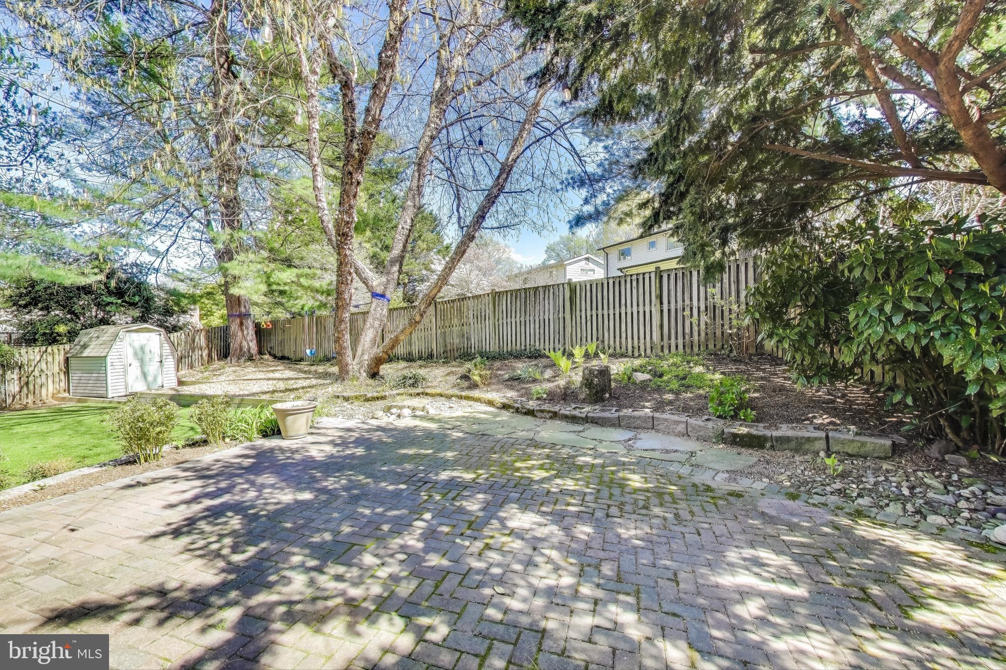 8905 Spring Valley Road Chevy Chase, MD 20815 - Photo 34 of 42 a view of a yard with of trees