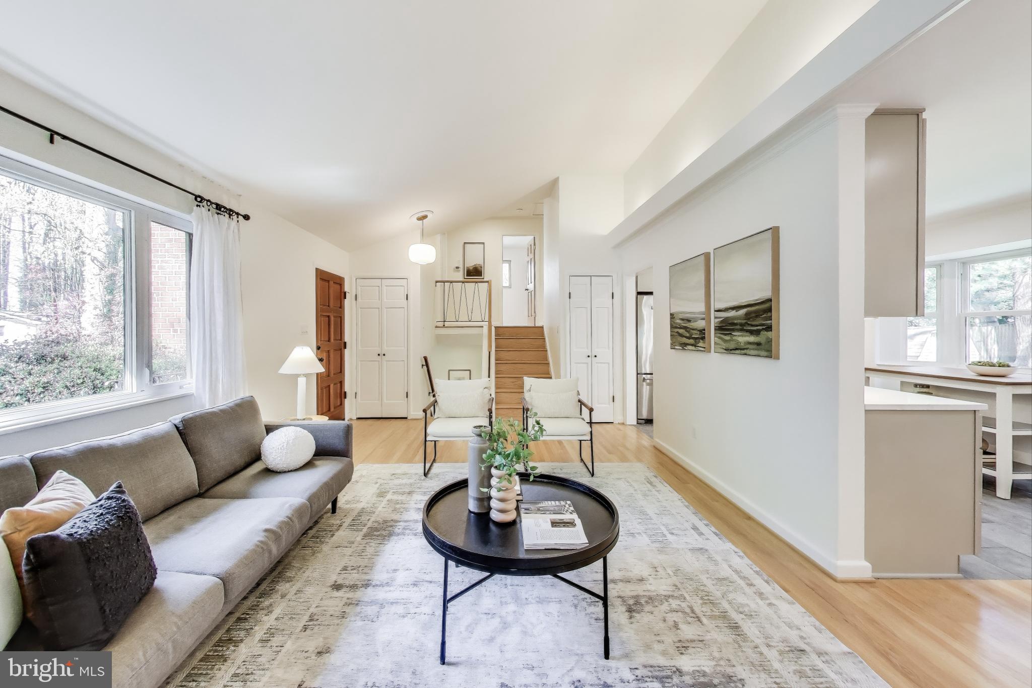 8905 Spring Valley Road Chevy Chase, MD 20815 - Photo 4 of 42 a living room with furniture and a large window