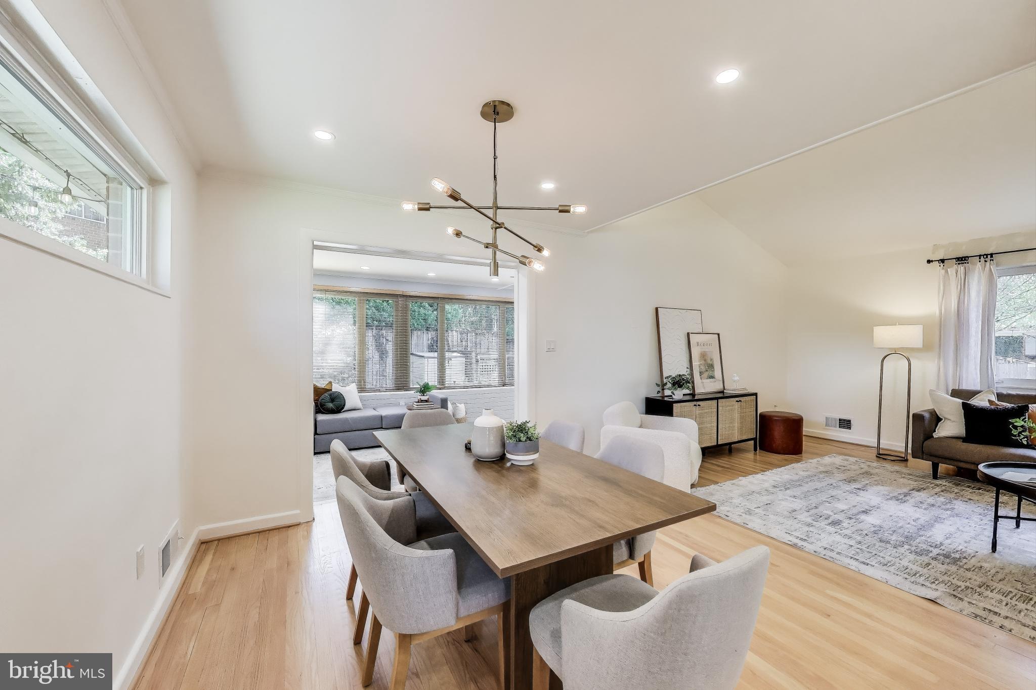 8905 Spring Valley Road Chevy Chase, MD 20815 - Photo 6 of 42 a view of a dining room with furniture window and outside view