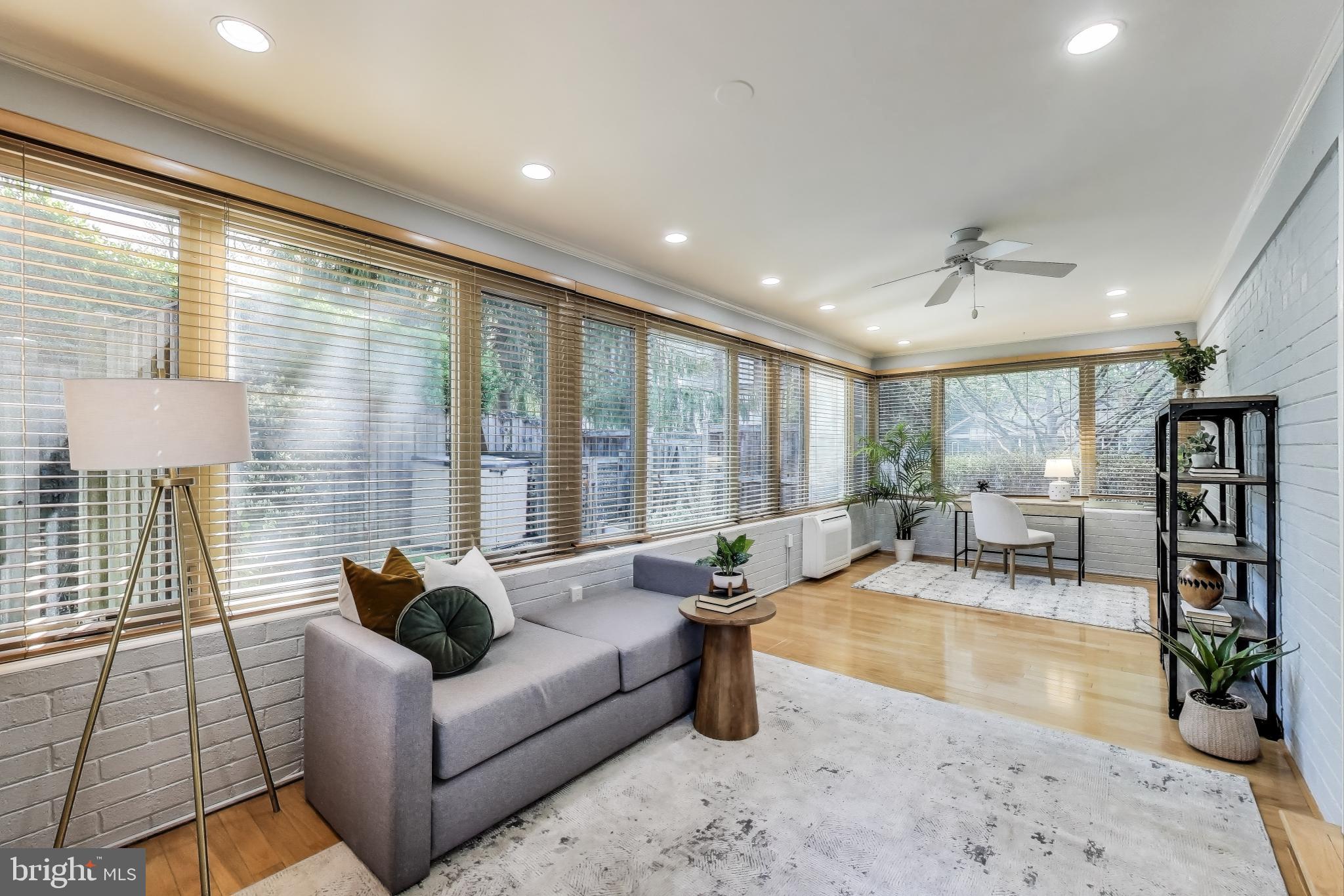 8905 Spring Valley Road Chevy Chase, MD 20815 - Photo 10 of 42 a living room with furniture and a table