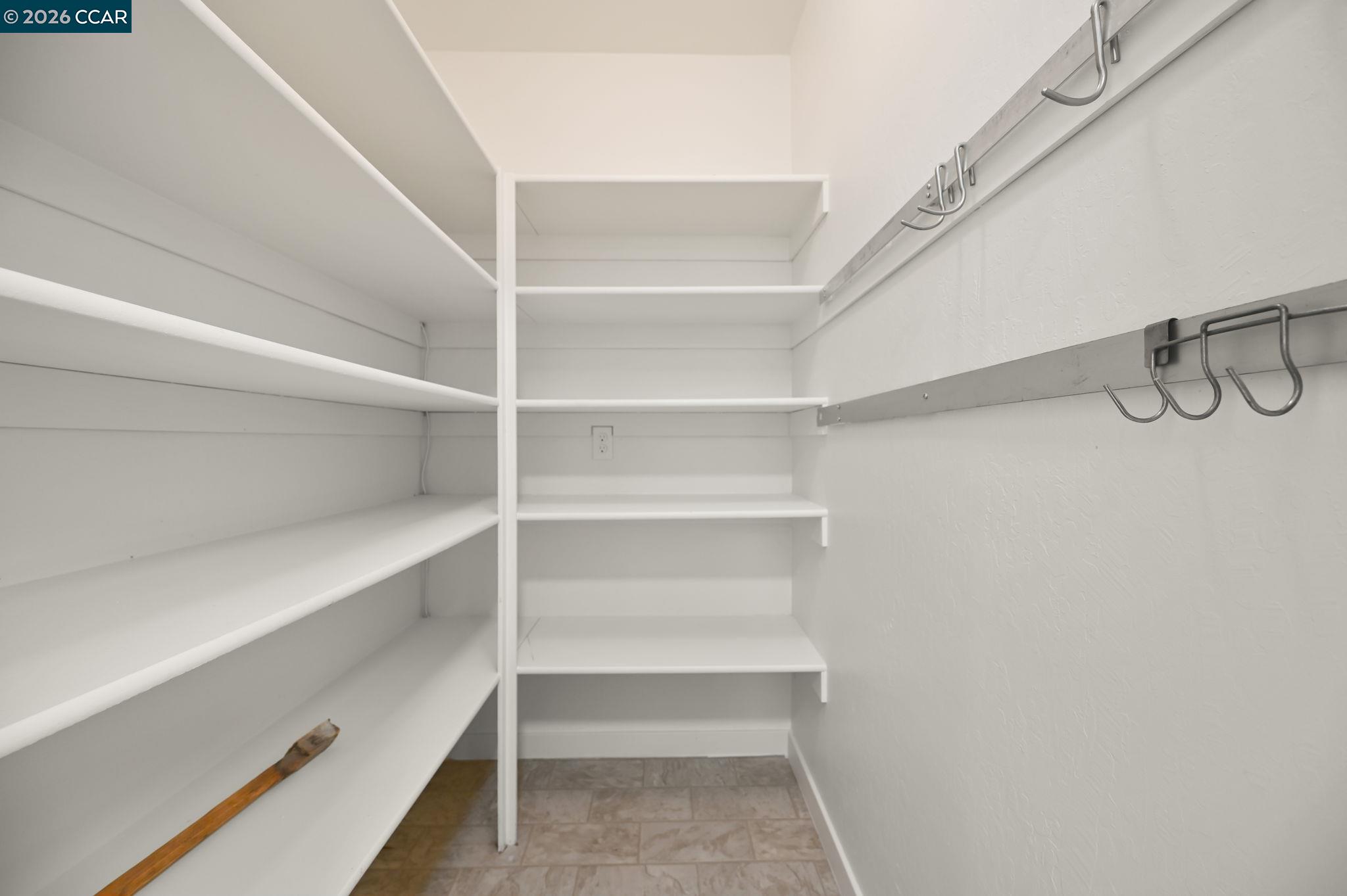 700 Miner Road Orinda, CA 94563 - Photo 15 of 37 a view of walk in closet with empty racks