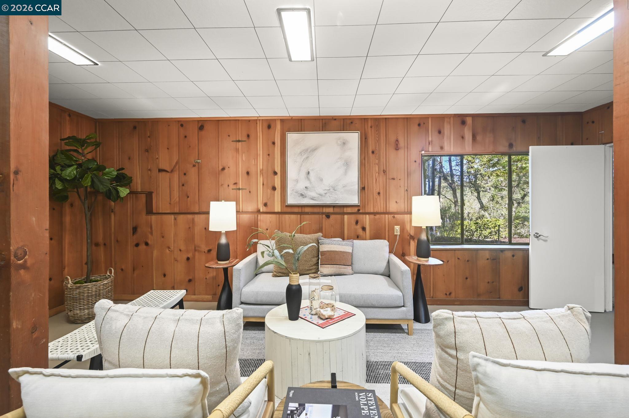 700 Miner Road Orinda, CA 94563 - Photo 24 of 37 a living room with furniture and a large window