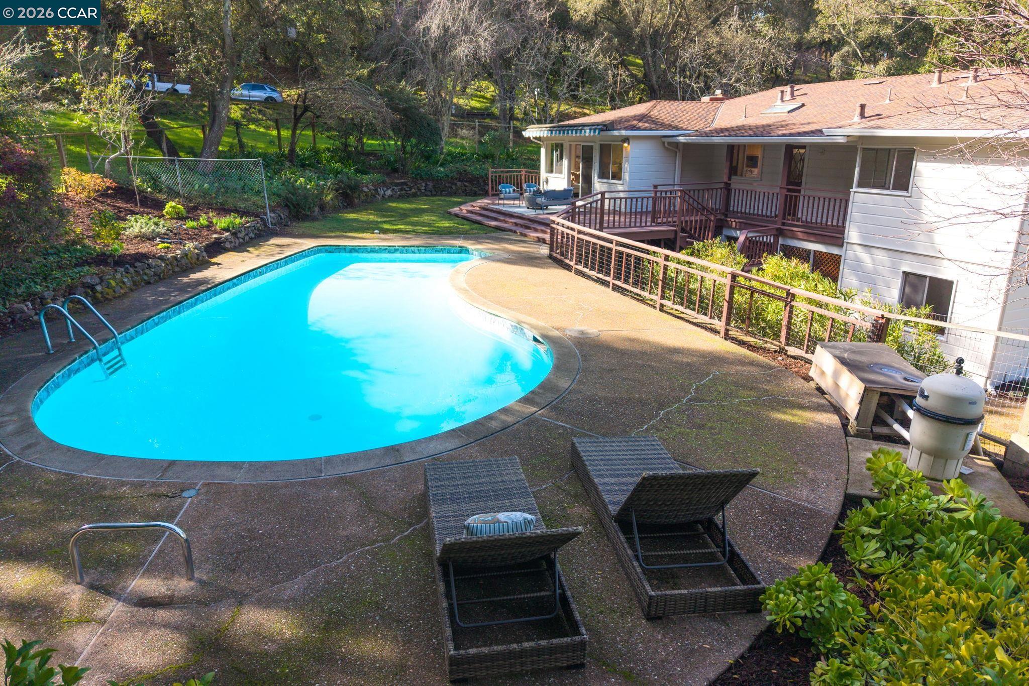700 Miner Road Orinda, CA 94563 - Photo 29 of 37 an aerial view of a house with swimming pool and patio