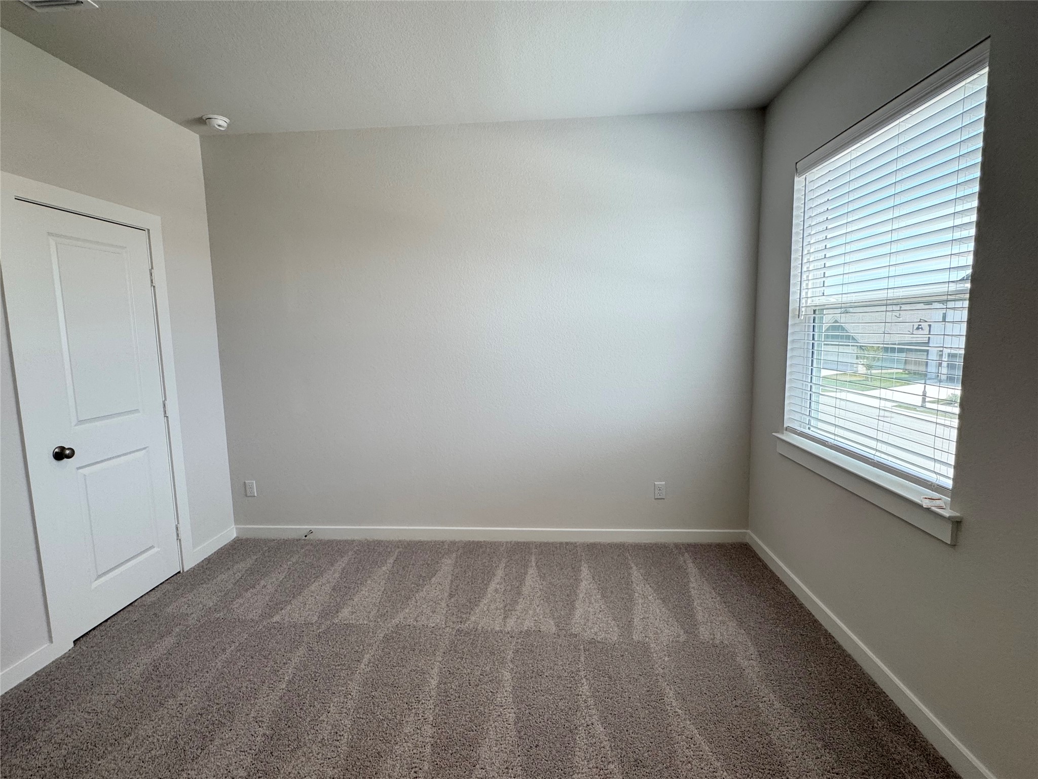 109 Corn Lane Hutto, TX 78634 - Photo 26 of 35 an empty room with a window
