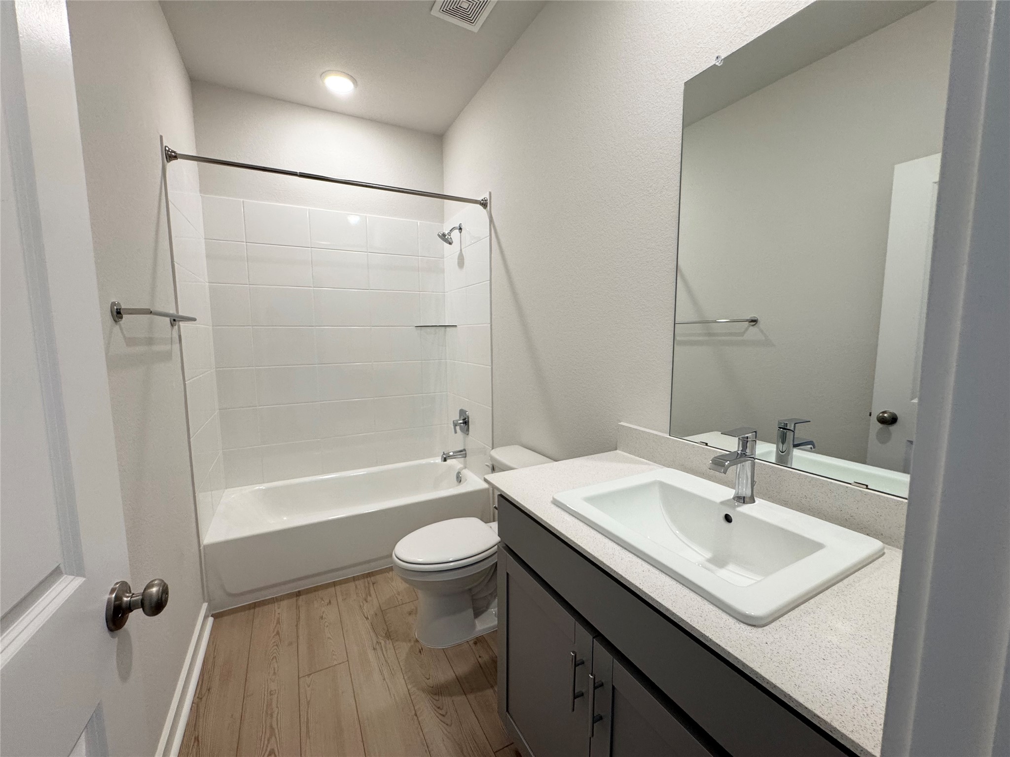 109 Corn Lane Hutto, TX 78634 - Photo 27 of 35 a bathroom with a sink toilet a mirror and shower
