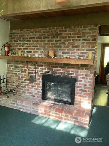 a fireplace with a table