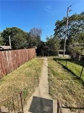 a view of swimming pool with a yard
