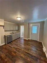 a view of a kitchen with a sink and dishwasher