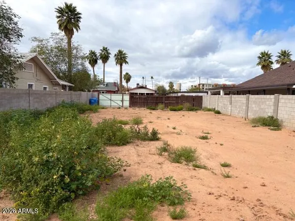 a view of swimming pool with a yard
