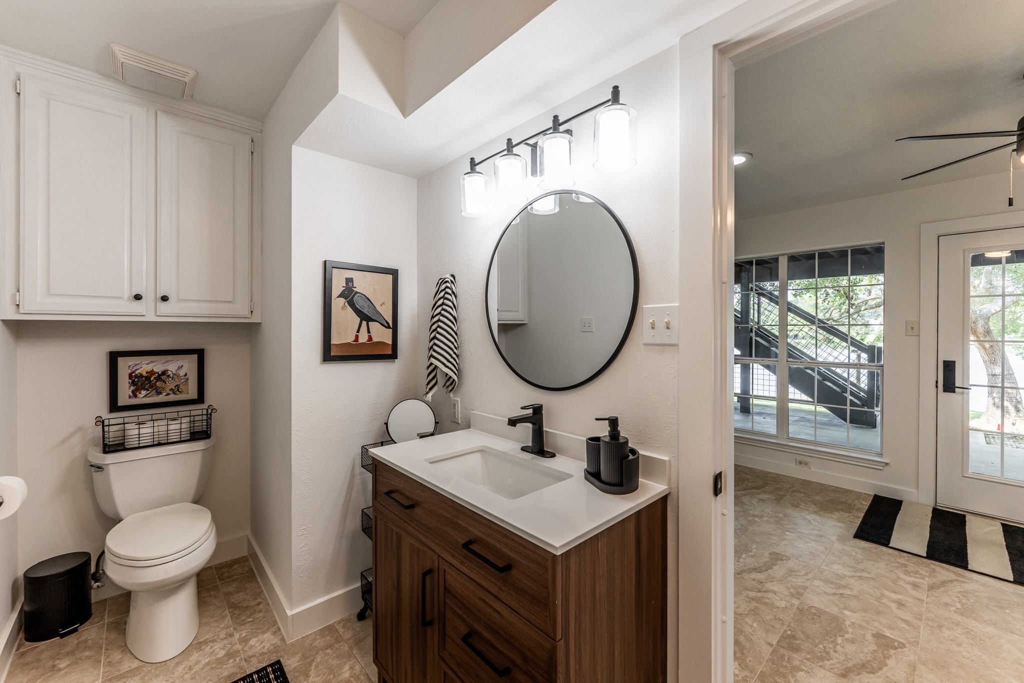 14 Lakeview Manor Huntsville, TX 77340 - Photo 35 of 48 a bathroom with a toilet sink and mirror