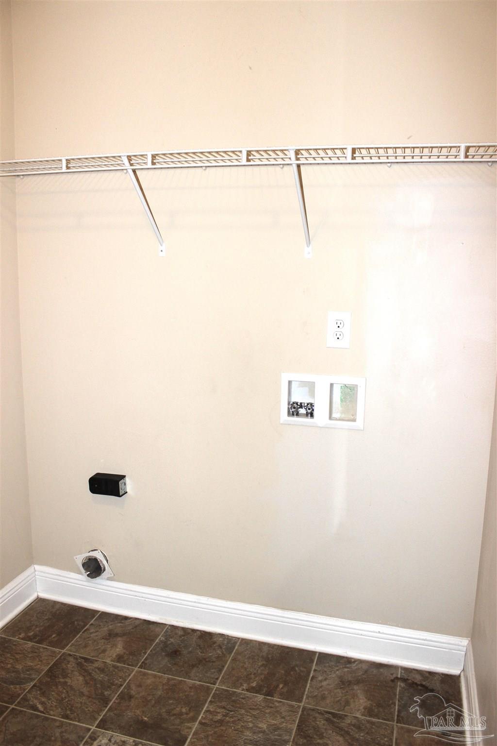 6364 Parakeet Trail Pensacola, FL 32503 - Photo 27 of 72 a view of small space with racks on the wall