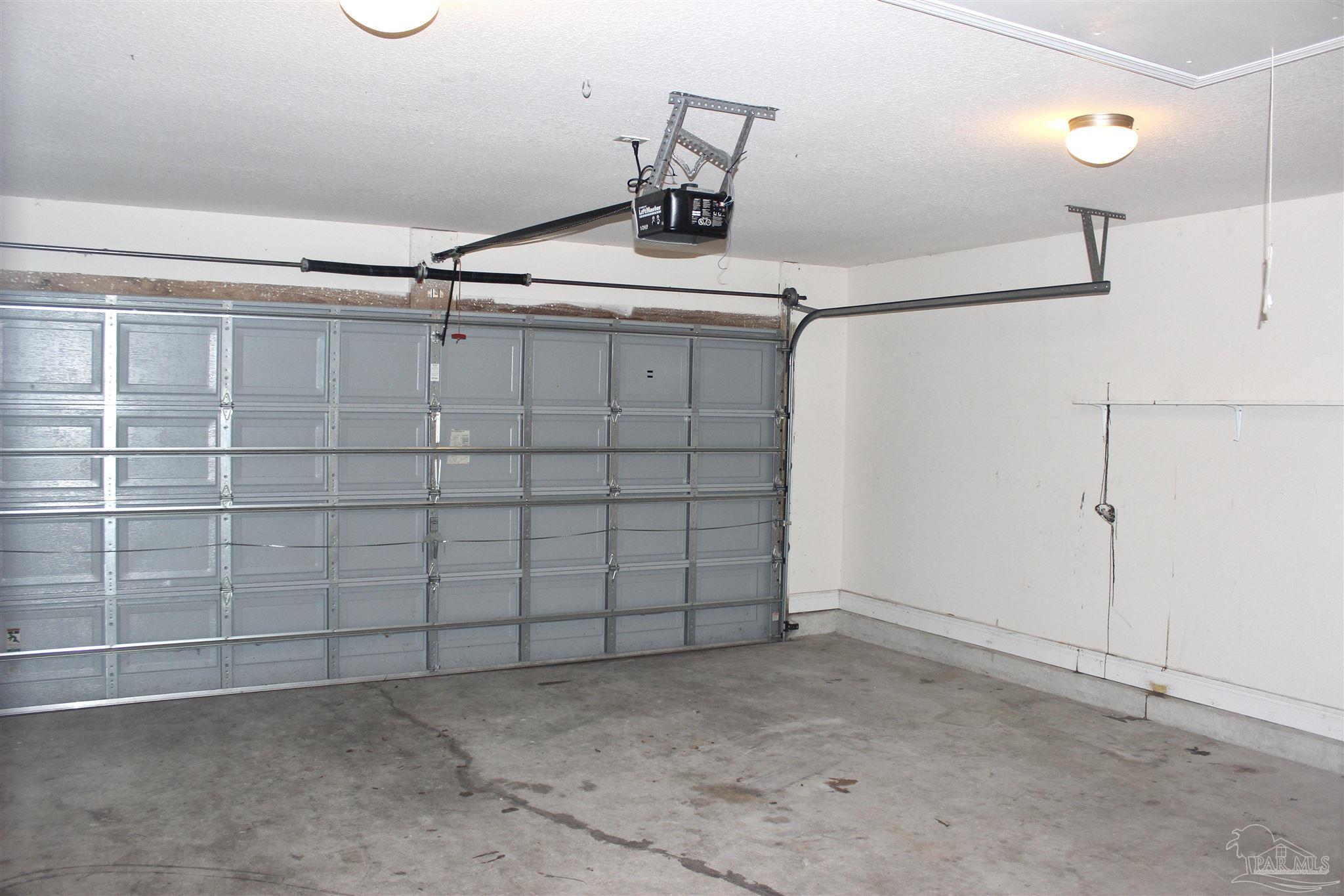 6364 Parakeet Trail Pensacola, FL 32503 - Photo 30 of 72 a view of a garage