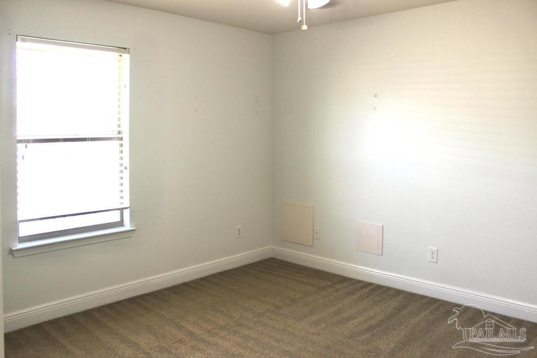 6364 Parakeet Trail Pensacola, FL 32503 - Photo 60 of 72 an empty room with a window