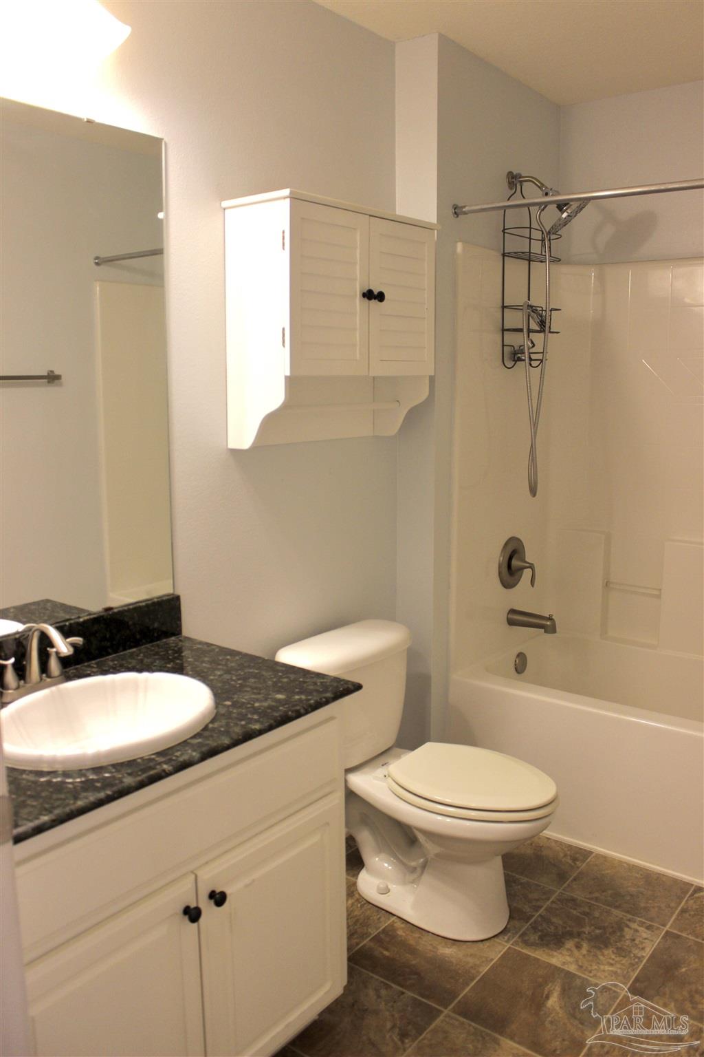 6364 Parakeet Trail Pensacola, FL 32503 - Photo 61 of 72 a bathroom with a sink a toilet and shower