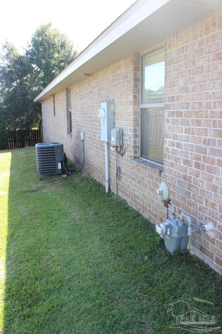 6364 Parakeet Trail Pensacola, FL 32503 - Photo 64 of 72 a view of a backyard with a garden