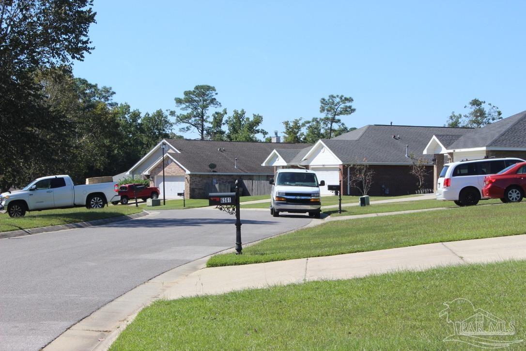6364 Parakeet Trail Pensacola, FL 32503 - Photo 70 of 72 a house view with a garden space
