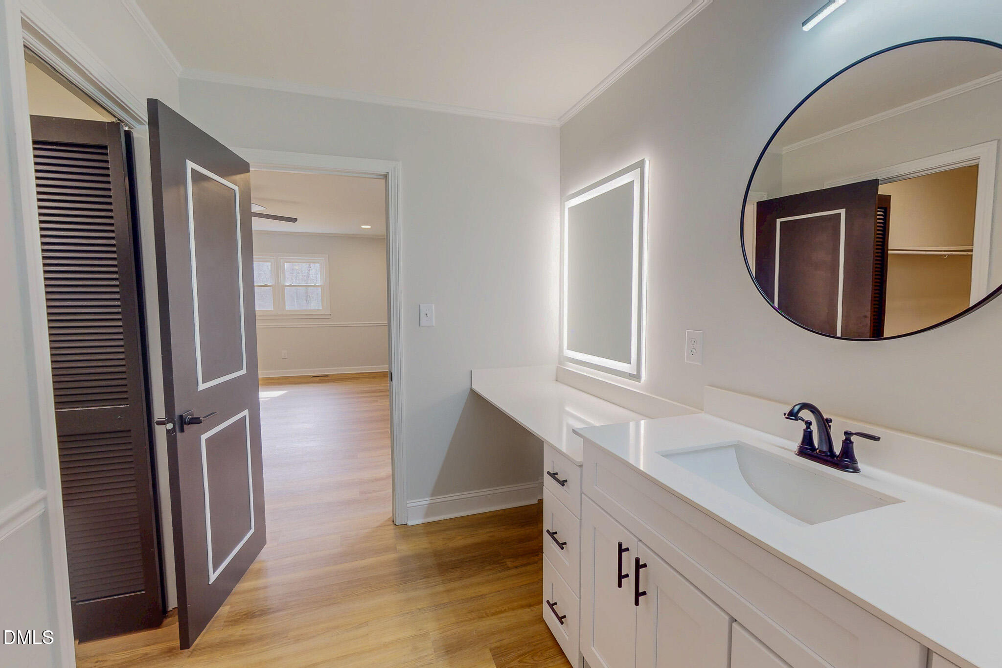 844 Holeman Ashley Road Timberlake, NC 27583 - Photo 14 of 58 a bathroom with a sink and a mirror
