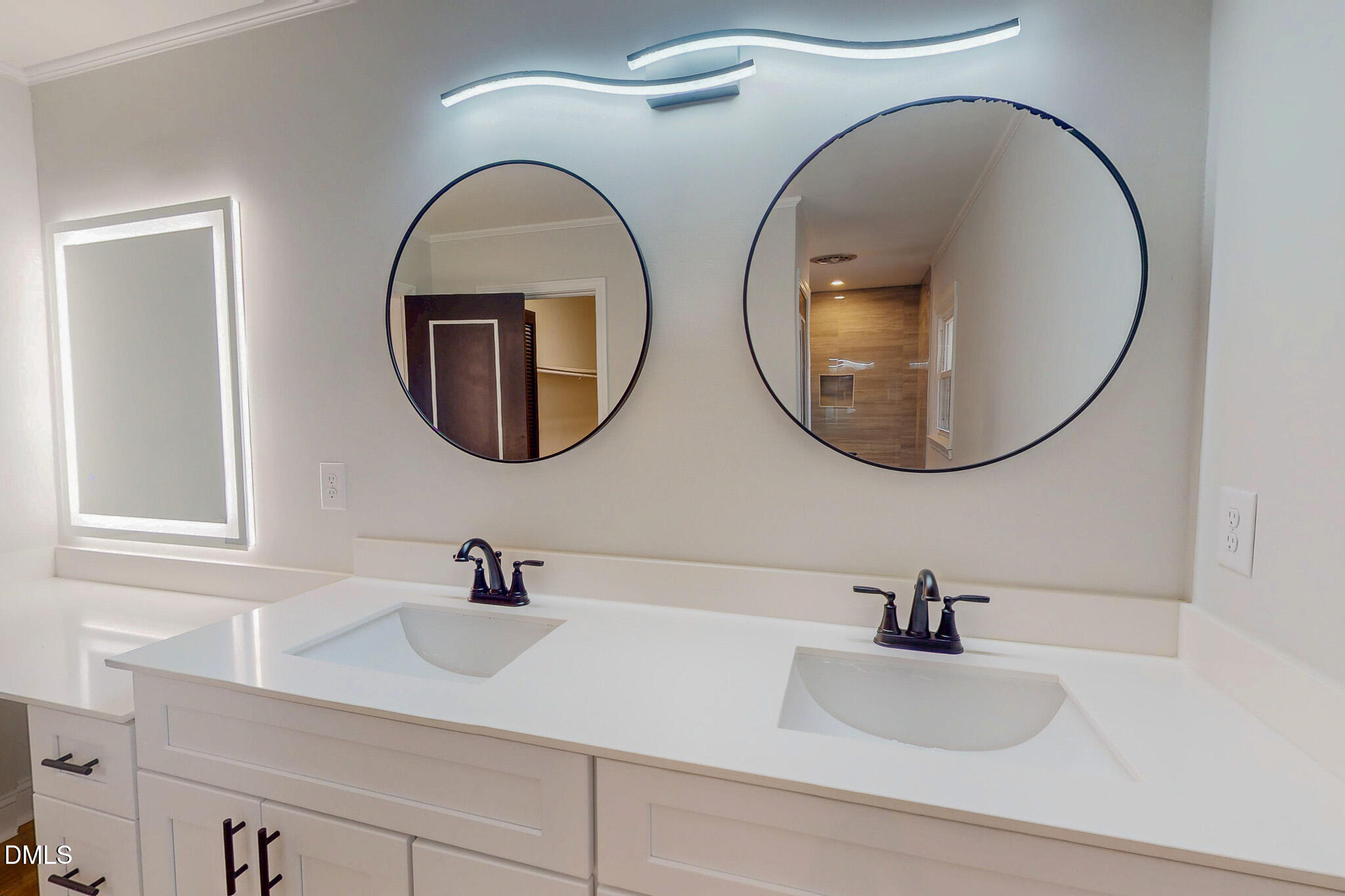 844 Holeman Ashley Road Timberlake, NC 27583 - Photo 17 of 58 a bathroom with a sink and a mirror