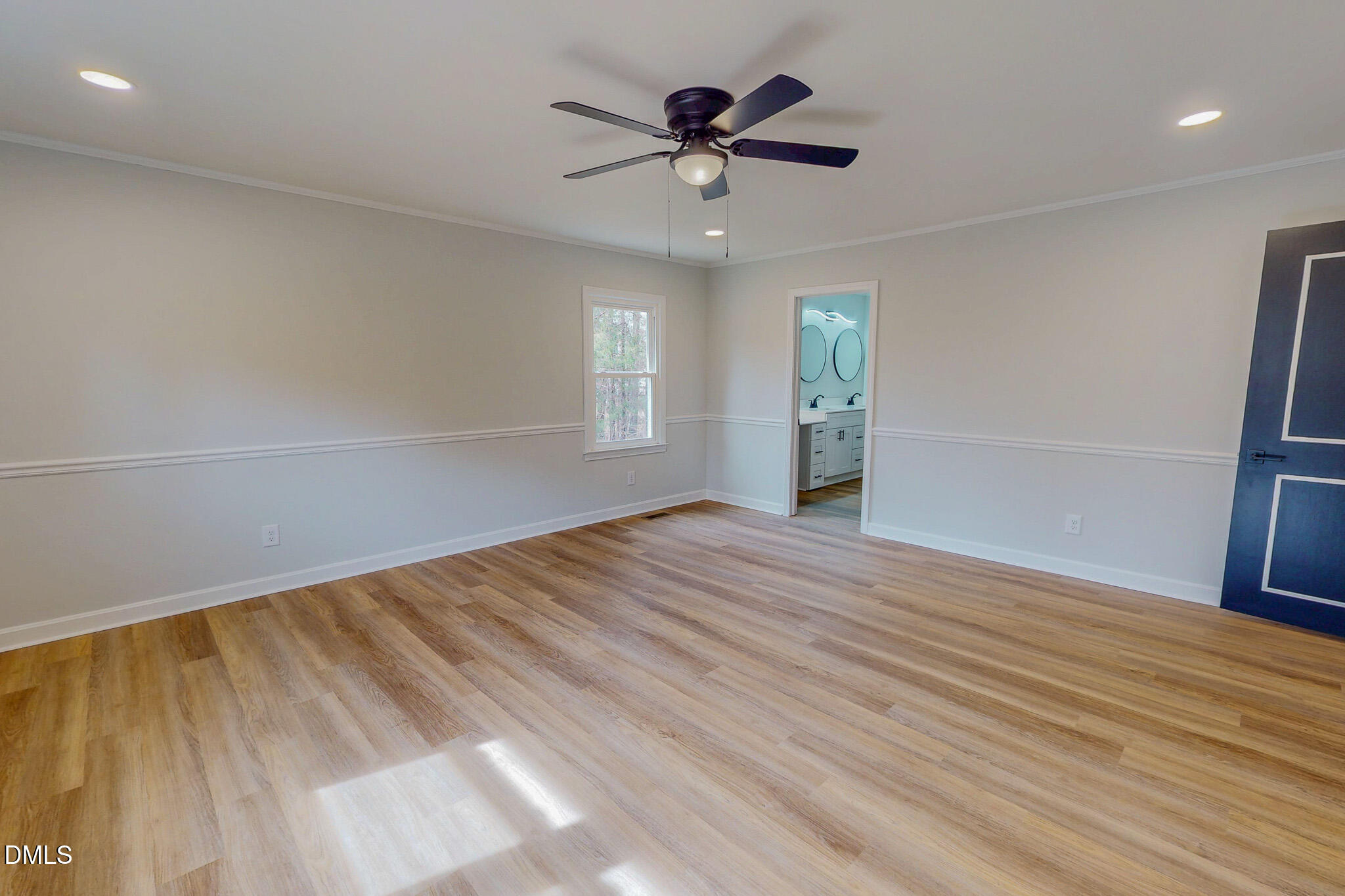 844 Holeman Ashley Road Timberlake, NC 27583 - Photo 20 of 58 wooden floor in an empty room with a window